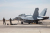 Pilots wait to board their F/A-18B Hornet trainer aircraft Poster Print by Timm Ziegenthaler/Stocktrek Images - Item # VARPSTTZG100336M