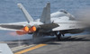 An F/A-18E Super Hornet launches from USS Nimitz Poster Print by Stocktrek Images - Item # VARPSTSTK107689M