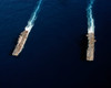 USS Iwo Jima steams alongside USS Kearsarge during a weapons off-load Poster Print by Stocktrek Images - Item # VARPSTSTK101663M