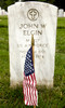 The American Flag rests in front a headstone Poster Print by Stocktrek Images - Item # VARPSTSTK101498M