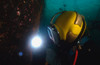 US Navy Diver welds a repair patch on the submerged bow of the USS Ogden Poster Print by Stocktrek Images - Item # VARPSTSTK102237M