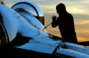 Airman tightens down the canopy of an F-16 Fighting Falcon Poster Print by Stocktrek Images - Item # VARPSTSTK102126M