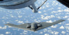 A B-2 Spirit approaches the refueling boom of a KC-135 Stratotanker Poster Print by Stocktrek Images - Item # VARPSTSTK105160M