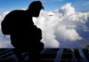 A Romanian paratrooper awaits his signal to jump out of a C-130J Super Hercules Poster Print by Stocktrek Images - Item # VARPSTSTK108718M