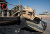 A Humvee debarks a landing craft air cushion Poster Print by Stocktrek Images - Item # VARPSTSTK105899M