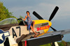 1940's style pin-up girl standing barefoot on the wing of a P-51 Mustang Poster Print by Christian Kieffer/Stocktrek Images - Item # VARPSTCHK100018M