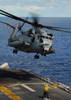 A CH-53E Sea Stallion helicopter takes off from amphibious assault ship USS Essex Poster Print by Stocktrek Images - Item # VARPSTSTK103880M