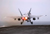 An F/A-18C Hornet launches from the flight deck aboard USS Theodore Roosevelt Poster Print by Stocktrek Images - Item # VARPSTSTK101255M