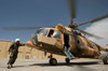 An Afghan Air Force aerial gunner makes final checks on a Mi-17 helicopter Poster Print by Stocktrek Images - Item # VARPSTSTK107700M