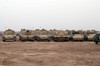 A selection of M992 CAT or Carrier Ammunition Tracked vehicles line up during a deployment Poster Print by Terry Moore/Stocktrek Images - Item # VARPSTTMO100094M