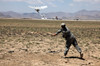 US Army soldier launches an RQ-11 Raven unmanned aerial vehicle Poster Print by Stocktrek Images - Item # VARPSTSTK105709M