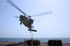 Marines hook cargo to an MH-60S Sea Hawk helicopter Poster Print by Stocktrek Images - Item # VARPSTSTK107802M