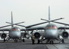 Clouds of sand surround a pair of S-3B Vikings on the flight deck aboard USS Harry S Truman Poster Print by Stocktrek Images - Item # VARPSTSTK100729M