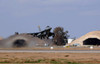An F-16 Fighting Falcon takes off from Balad Air Base, Iraq Poster Print by Stocktrek Images - Item # VARPSTSTK102265M