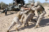Soldiers move the muzzle-end of a M777 Lightweight Howitzer Poster Print by Stocktrek Images - Item # VARPSTSTK101717M