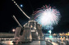 Fireworks light up the sky behind the guided missile destroyer JS Kirishima Poster Print by Stocktrek Images - Item # VARPSTSTK108693M