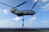 A trio of Marines fast rope from a CH-46E Sea Knight helicopter Poster Print by Stocktrek Images - Item # VARPSTSTK105547M