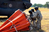 CH-47 Chinook helicopter crew prepare to install the Bambi Bucket on the aircraft Poster Print by Stocktrek Images - Item # VARPSTSTK105103M