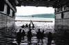Sailors play football during a swim call in the well deck of USS Cleveland Poster Print by Stocktrek Images - Item # VARPSTSTK105065M