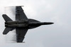 An F/A-18F Super Hornet speeds up for a supersonic fly-by Poster Print by Stocktrek Images - Item # VARPSTSTK101668M