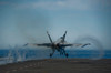 An F/A-18C Hornet launches from the flight deck of USS Carl Vinson Poster Print by Stocktrek Images - Item # VARPSTSTK106826M