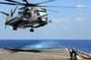 A CH-53E Super Stallion lifts off from an amphibious dock landing ship Poster Print by Stocktrek Images - Item # VARPSTSTK104262M