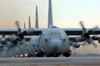 C-130 Hercules aircraft taxi out for a mission during a six-ship sortie Poster Print by Stocktrek Images - Item # VARPSTSTK101137M