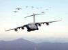 A formation of 17 C-17 Globemaster IIIs fly over the Blue Ridge Mountains Poster Print by Stocktrek Images - Item # VARPSTSTK100969M