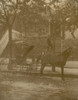 African American doctor carrying small leather bag, standing on steps to residence, horse-drawn carriage in the foreground Poster Print - Item # VARBLL0587632550