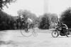 Motorcycle cop chases a Penny Farthing Velocipede down a DC Street with Washington Monument in background Poster Print by unknown - Item # VARBLL0587244461