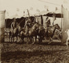 Wild West Show Indian War Party.  Group Of Indian Performers Returns To The Backstage Area, Spattered In Mud. Behind Them, We Can See The Audience Filling The Stands, Poster Print - Item # VARBLL0587403373