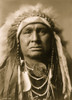 Portrait, man, head-and-shoulders, facing front, feather headdress, shell concho and shell beads around neck. Poster Print - Item # VARBLL058747486L