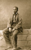 Portrait of an African American man, seated Poster Print - Item # VARBLL0587632771