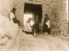 Four young Hopi women gather outside of an entrance. Poster Print - Item # VARBLL058747730L