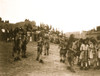 Hopi Indians, Arizona, in snake ceremony, with pueblo and onlookers in background. Poster Print - Item # VARBLL058747467L