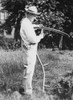 Calvin Coolidge with a Scythe Poster Print - Item # VARBLL058756587L