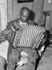 African American Mr. Dyson, aged FSA  borrower plays the accordion. Poster Print - Item # VARBLL058745015L