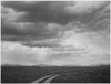 Roadway low horizon mountains clouded sky "Near Teton National Park" 1933 - 1942 Poster Print by Ansel Adams - Item # VARBLL058740079x