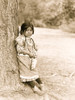 Innocence, an Umatilla girl, full-length portrait, standing by tree, facing slightly right Poster Print - Item # VARBLL058747560L