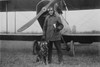 Aviator Frank Stanton & his Dog, Price of Princeton both wear flight goggles and pose in front of their biplane Poster Print by unknown - Item # VARBLL058745815L