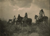 Four Apaches on horseback under storm clouds. Poster Print - Item # VARBLL058746935L
