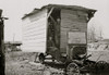 One-room hut housing family of nine built over chassis of abandoned Ford in open field between Camden and Bruceton, Tennessee, near Tennessee River Poster Print - Item # VARBLL058756673L