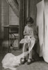 Young Girl cuts lace in here tenement apartment Poster Print - Item # VARBLL058754533L