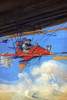 a woman at the wheel of a futuristic aircraft. A man sits beside her. Poster Print by unknown - Item # VARBLL0587234458