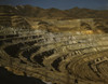 Carr Fork Canyon as seen from "G" bridge, Bingham Copper Mine, Utah. In the background can be seen a train with waste or over-burden material on its way to the dump Poster Print - Item # VARBLL058750772L