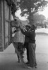 African American Helps a woman on board the migratory worker truck Poster Print - Item # VARBLL058744917L
