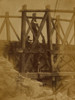 Military railroad operations in northern Virginia: two men boring holes in bridge trestles and man with Haupt's Torpedo Poster Print - Item # VARBLL058753436L