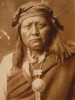 Head-and-shoulders portrait of a Native American man, facing front. Poster Print - Item # VARBLL058747019L