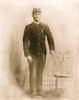 Unidentified African American soldier, 9th cavalry, full-length portrait, standing, facing front, wearing uniform with marksman badge and sharpshooters medal, and kepi with crossed sabers Poster Print - Item # VARBLL0587634030