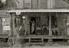 African American and a white store owner on the Porch of a country store Poster Print - Item # VARBLL058744983L